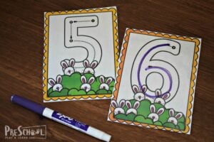 Trace the numbers with a dry erase marker, erase, and repeat!