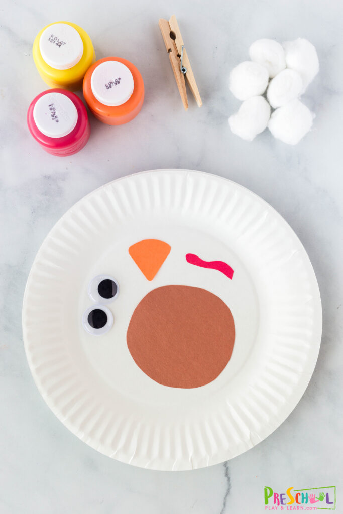 white paper plate cotton balls clothespin washable paint (red, orange, yellow) construction paper (brown, orange, red) google eyes