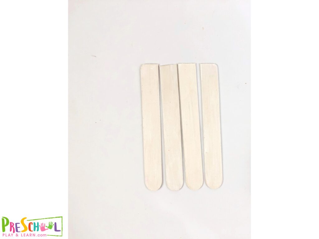 Grab 4 popsicle sticks. Cut off the ends to make the popsicle sticks flat. This step should be done by a grown-up, so leave out this step completely since it's not essential to the making of the craft.