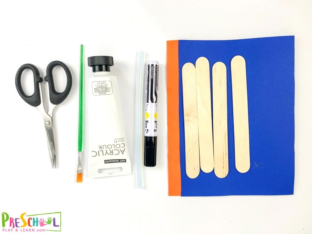 Popsicle sticks
Construction paper (blue and orange)
Marker
White paint
Paint brush
Scissor
Glue

Gather the supplies required and get crafting!