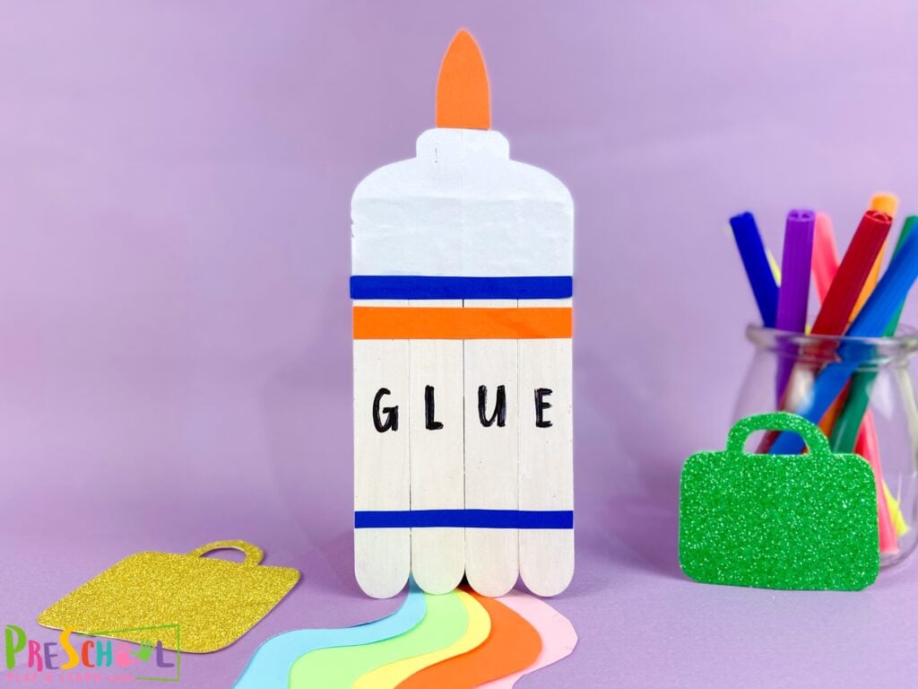 Get your kids excited for back-to-school by trying out this easy and fun Popsicle Stick Craft that combines school supplies with creativity! Learn how to make your own liquid glue craft by checking out our blog post.
