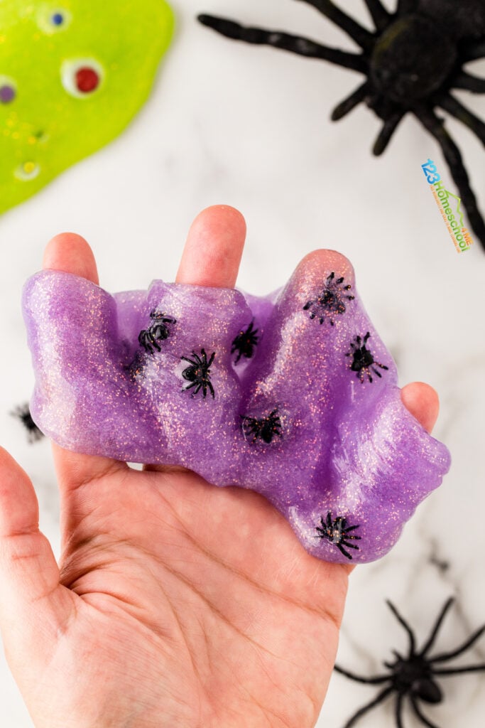 purple slime with black spiders