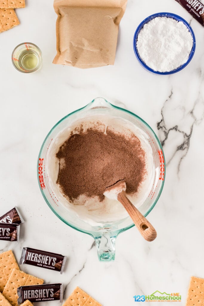 Add 3.5 oz of instant chocolate pudding mix to the melted marshmallows and stir!