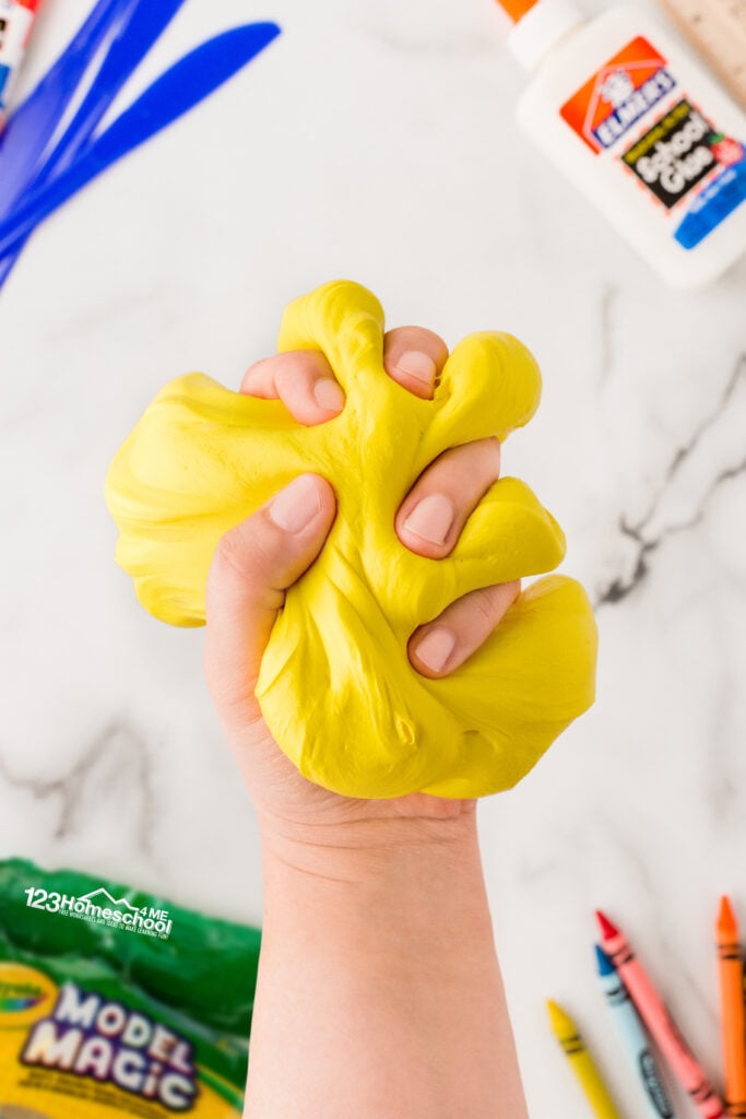 Butter slime has a different texture than normal slime, it is mega fluffy and slightly firmer. My kids prefer the texture of this fluffy butter slime as they stretch it, pile it, twist it, make impressions in it, etc.