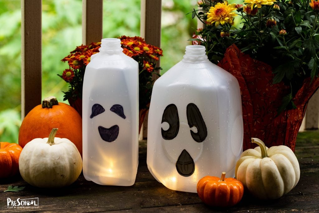 Create adorable glowing ghost milk jugs for Halloween that double as a fun preschool craft and festive decorations!